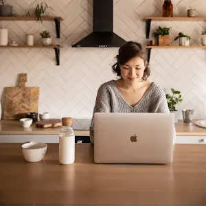 women working on a laptop 